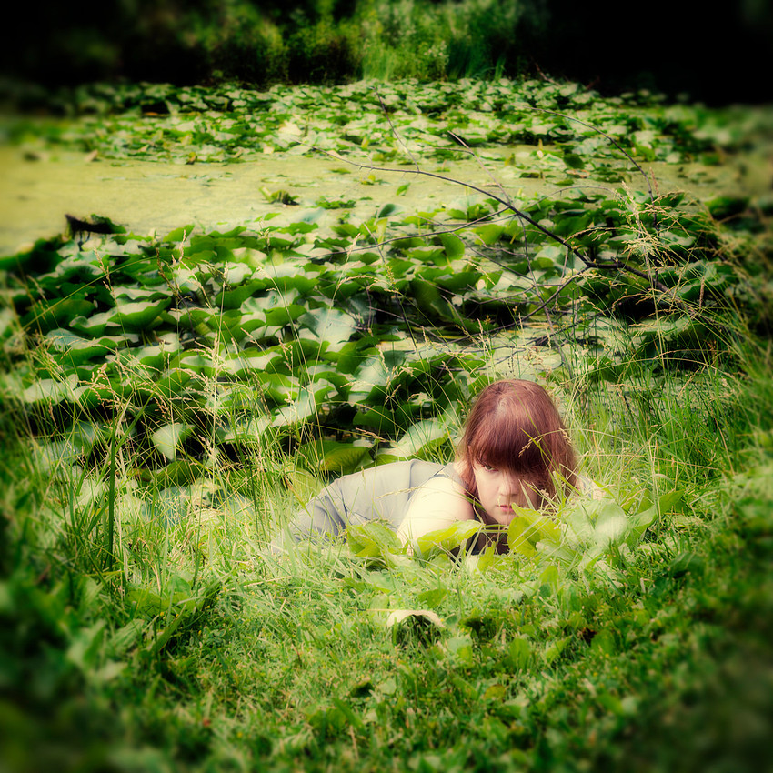 fine art portrait photography, woman, lily pads nature, green