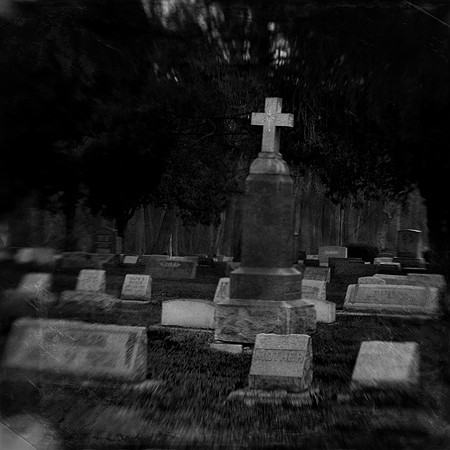 Black and white cemetery photograph, monochrome, dark photo