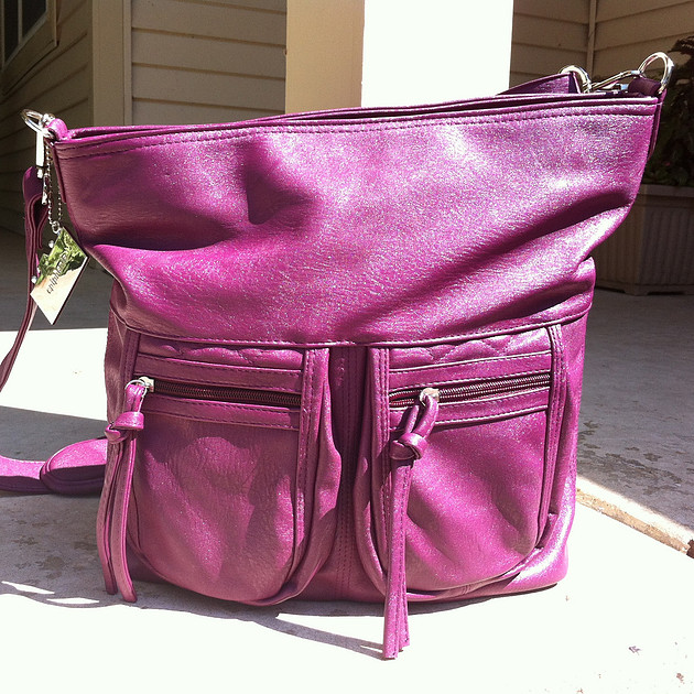 Epiphanie lyric bag in plum filled with stuff
