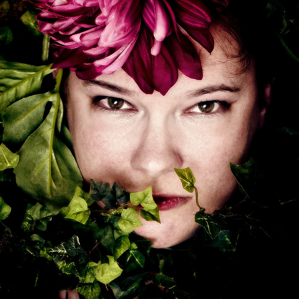 fine art portrait woman's face with flower